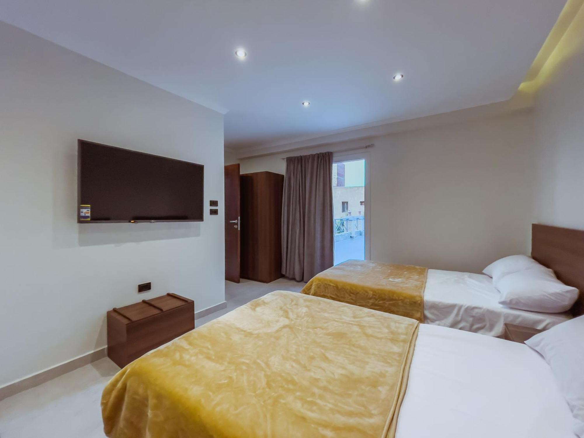 King Khufu Pyramids View Hotel Kafret el-Gabal Rom bilde