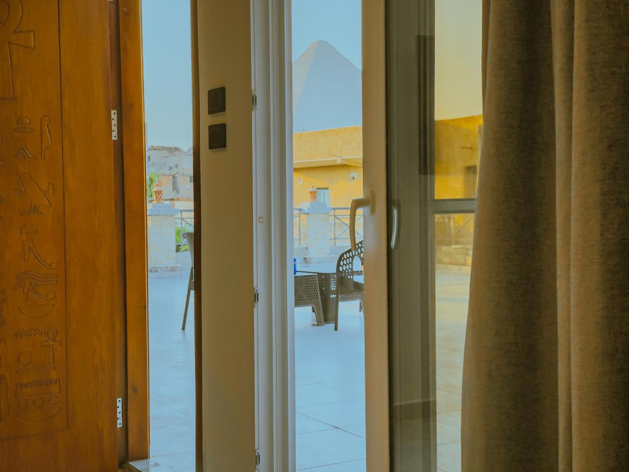 King Khufu Pyramids View Hotel Kafret el-Gabal Rom bilde