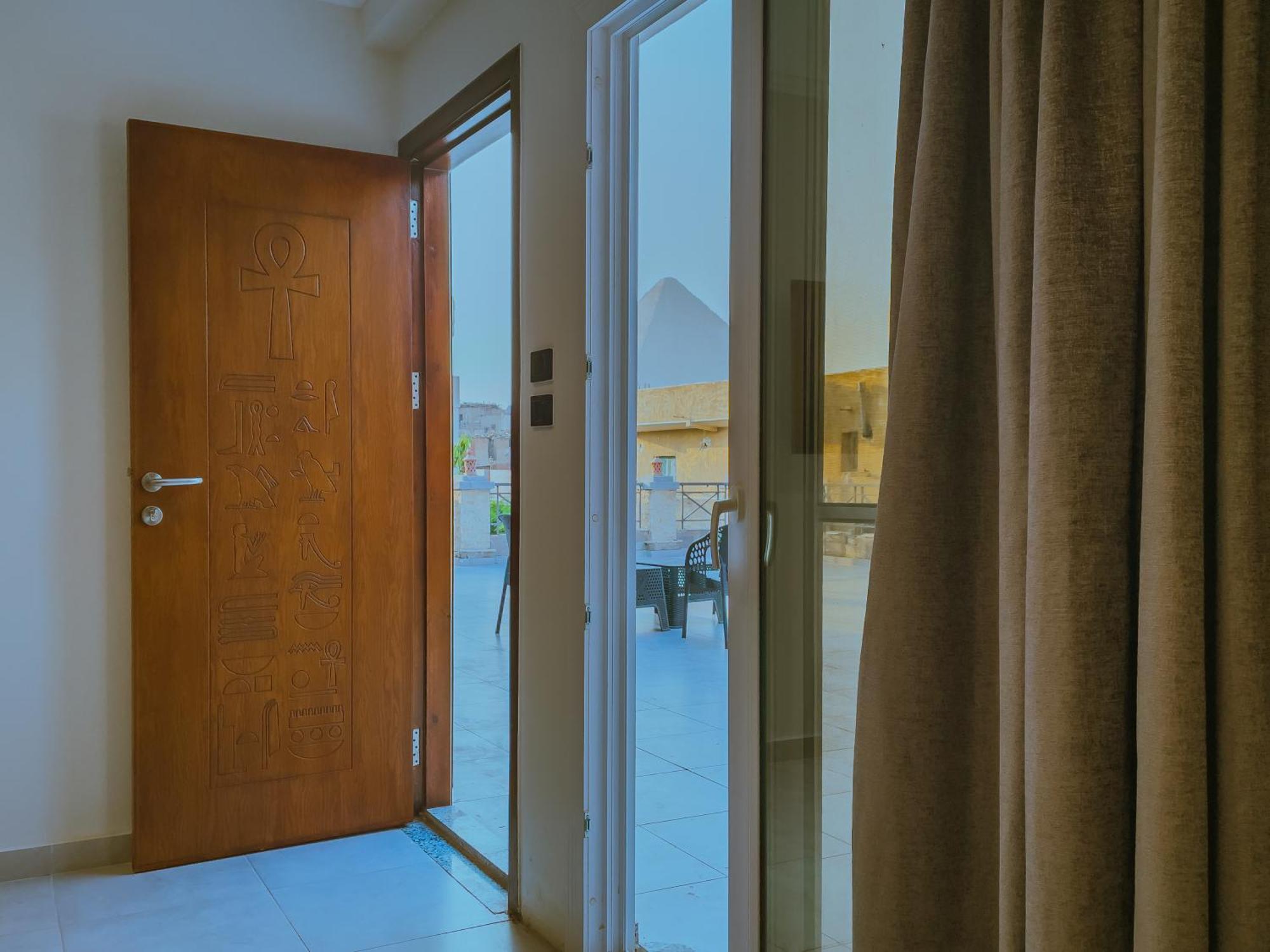 King Khufu Pyramids View Hotel Kafret el-Gabal Rom bilde