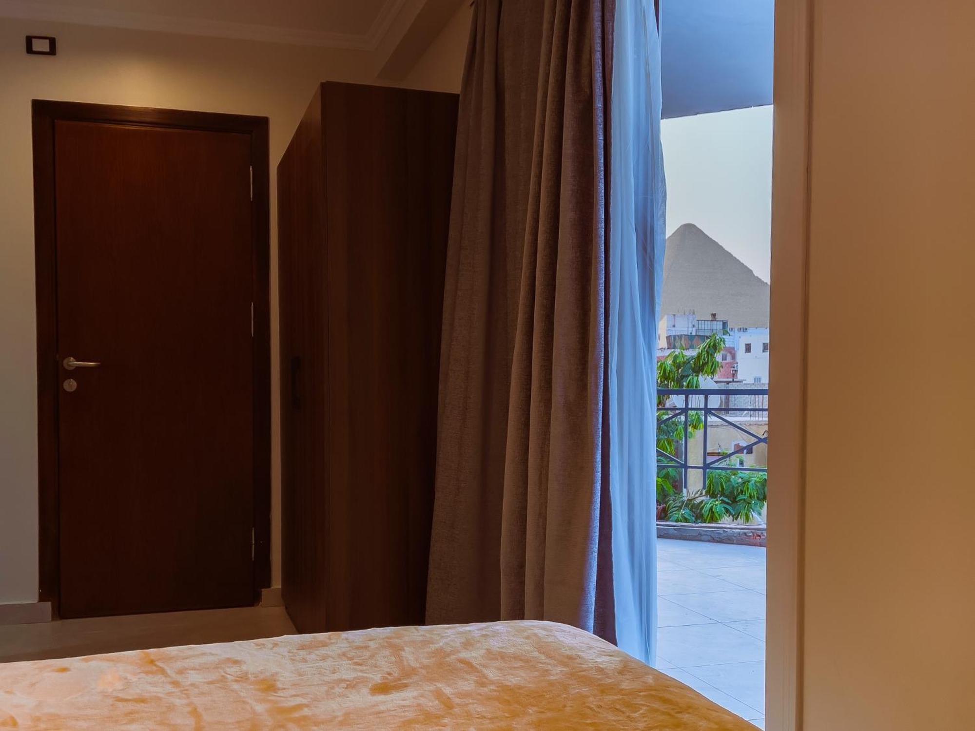 King Khufu Pyramids View Hotel Kafret el-Gabal Rom bilde