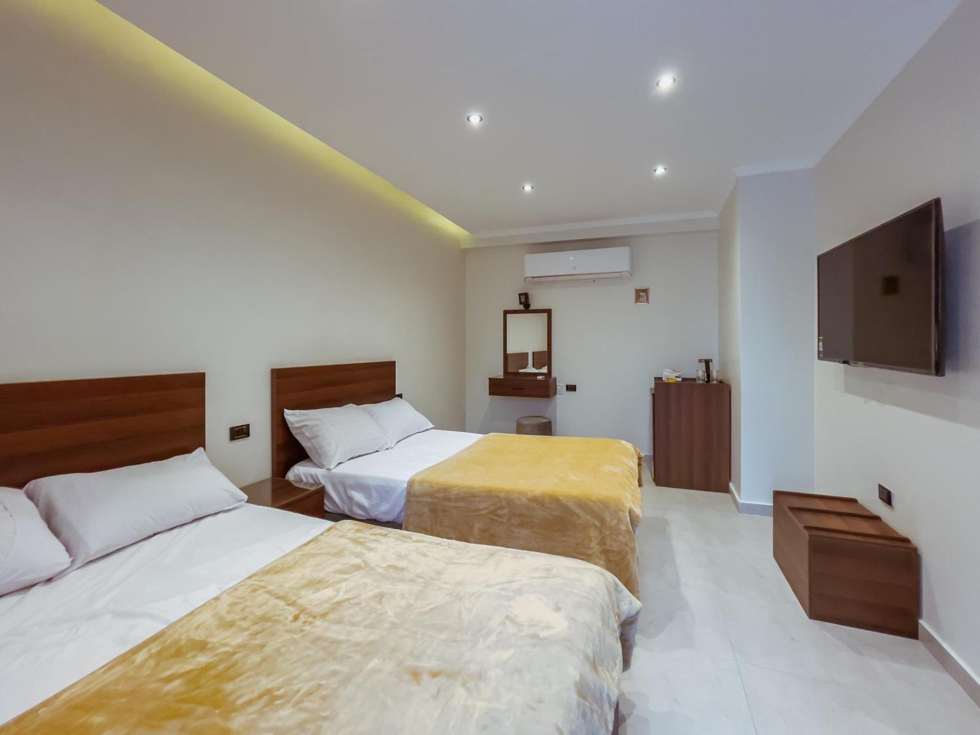 King Khufu Pyramids View Hotel Kafret el-Gabal Rom bilde