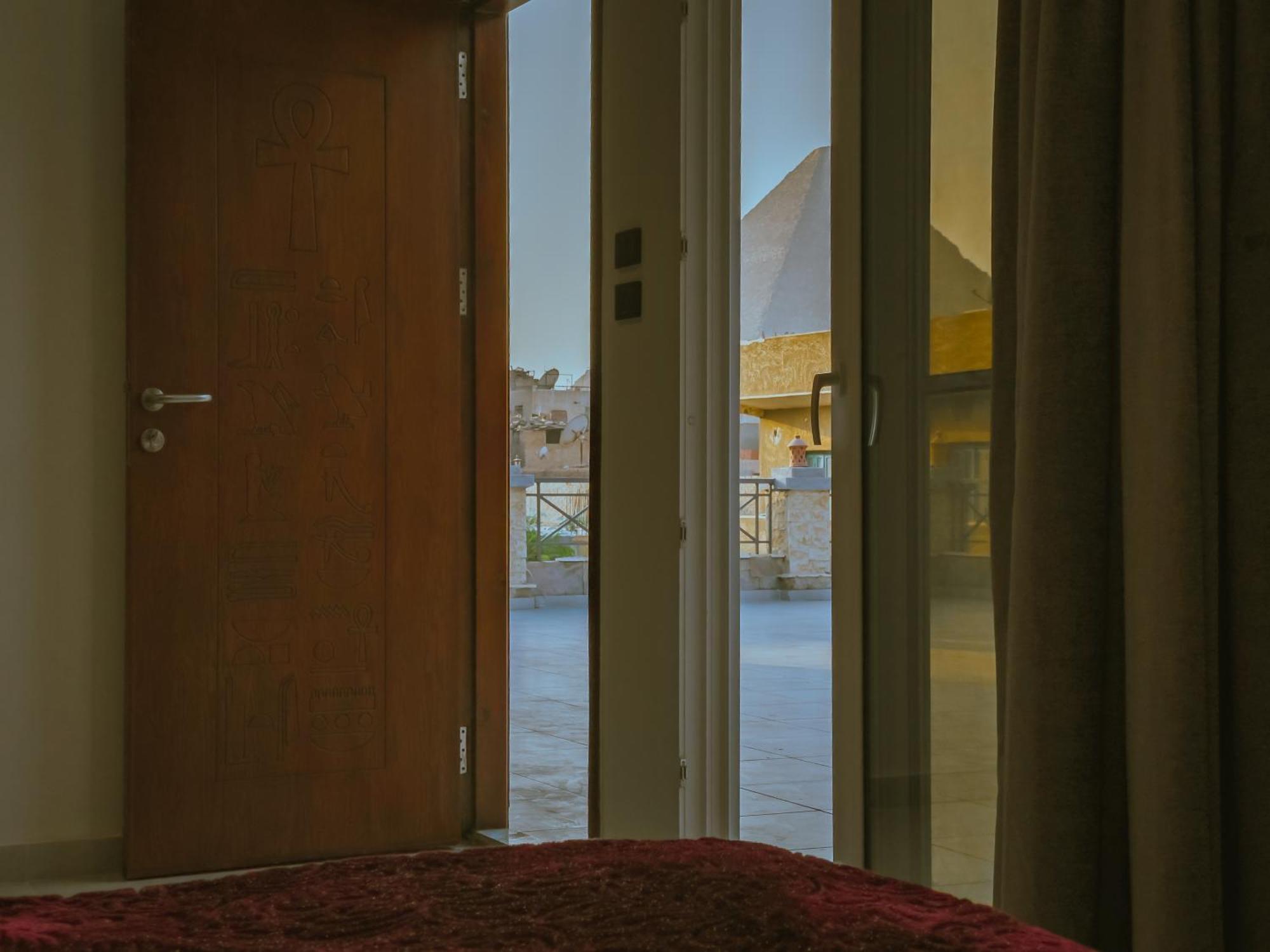 King Khufu Pyramids View Hotel Kafret el-Gabal Rom bilde